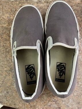 Vans Slip-On Sneakers in Dark Gray with White Trim